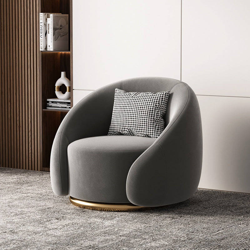 Fauteuil pivotant arrondi en velours, socle doré