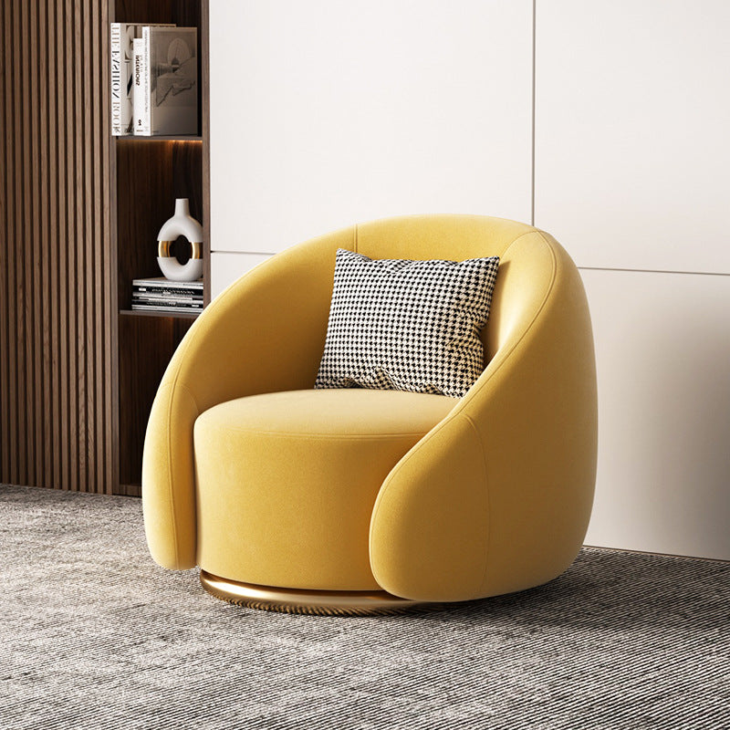 Fauteuil pivotant arrondi en velours, socle doré