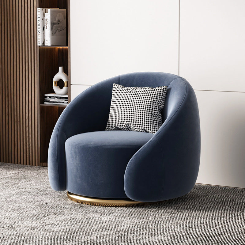 Fauteuil pivotant arrondi en velours, socle doré