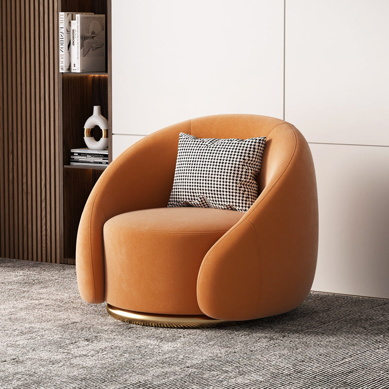 Fauteuil pivotant arrondi en velours, socle doré