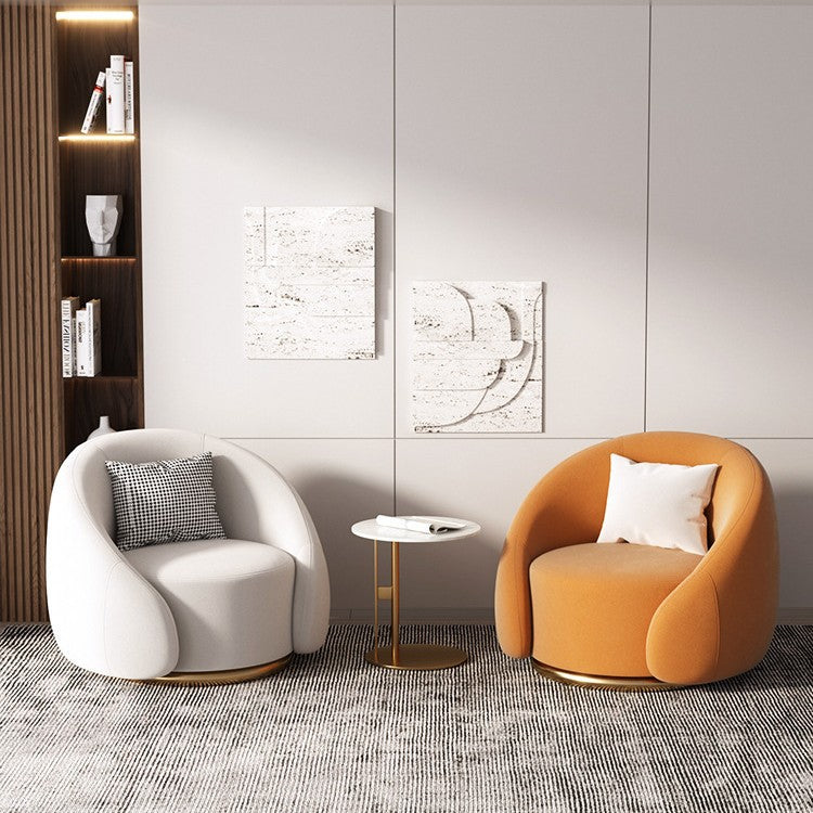 Fauteuil pivotant arrondi en velours, socle doré