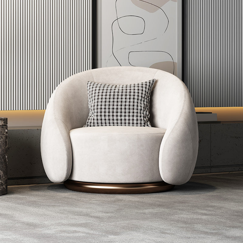Fauteuil pivotant arrondi en velours, socle doré