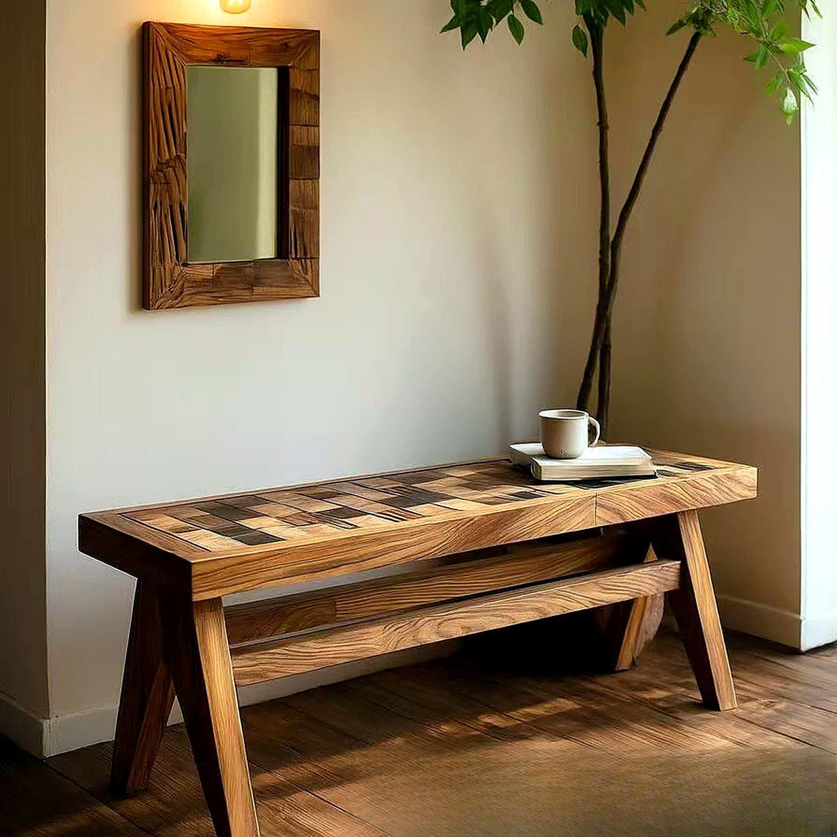 Banc en orme massif marqueté façon échiquier dans une entrée avec miroir