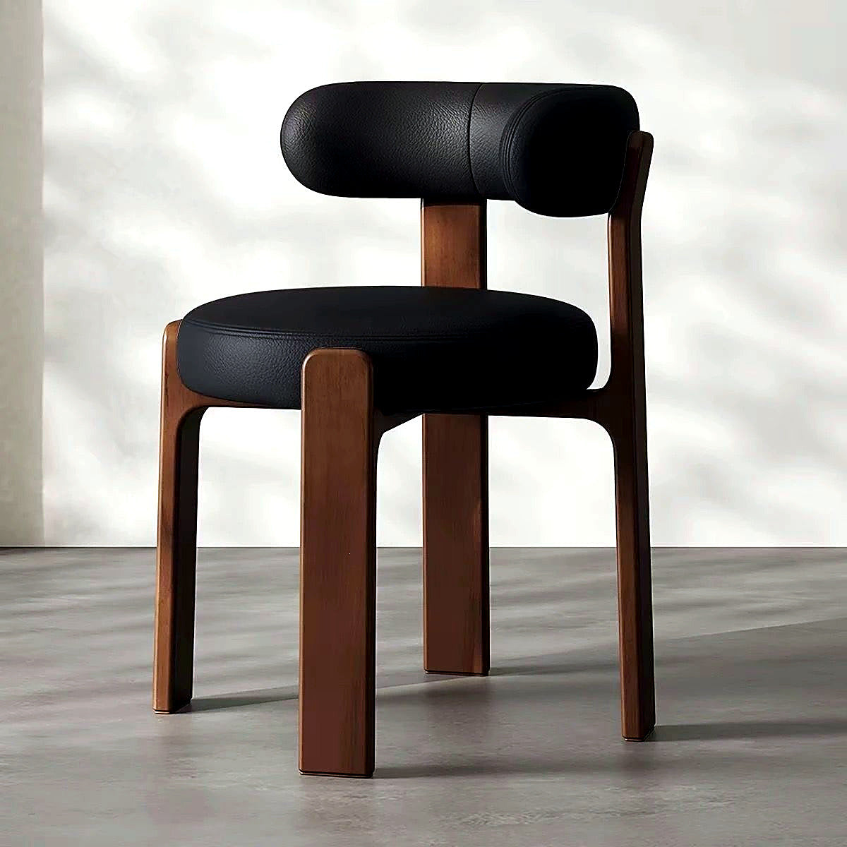 Fauteuil cocon en cuir, piètement bois massif