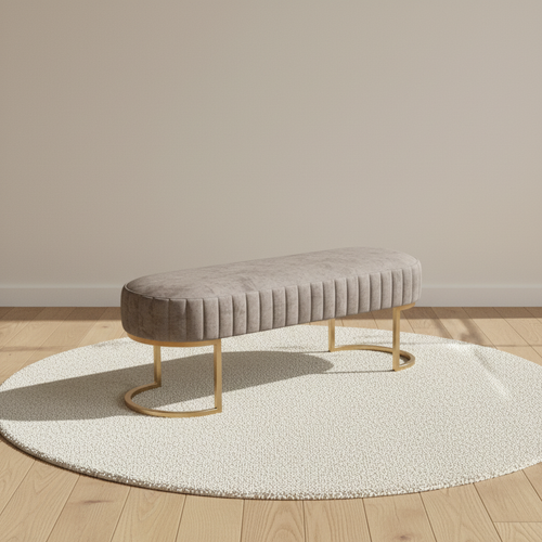 Banc bout de lit ovale en velours côtelé gris et pieds dorés – mise en scène