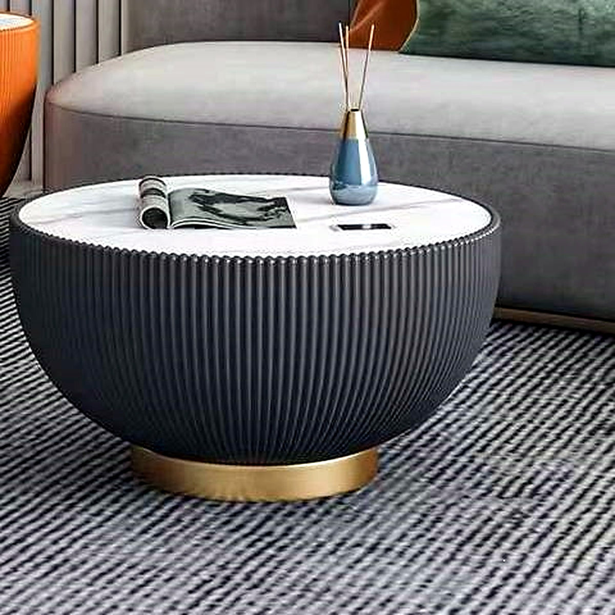 Grande table basse ronde cannelée noire