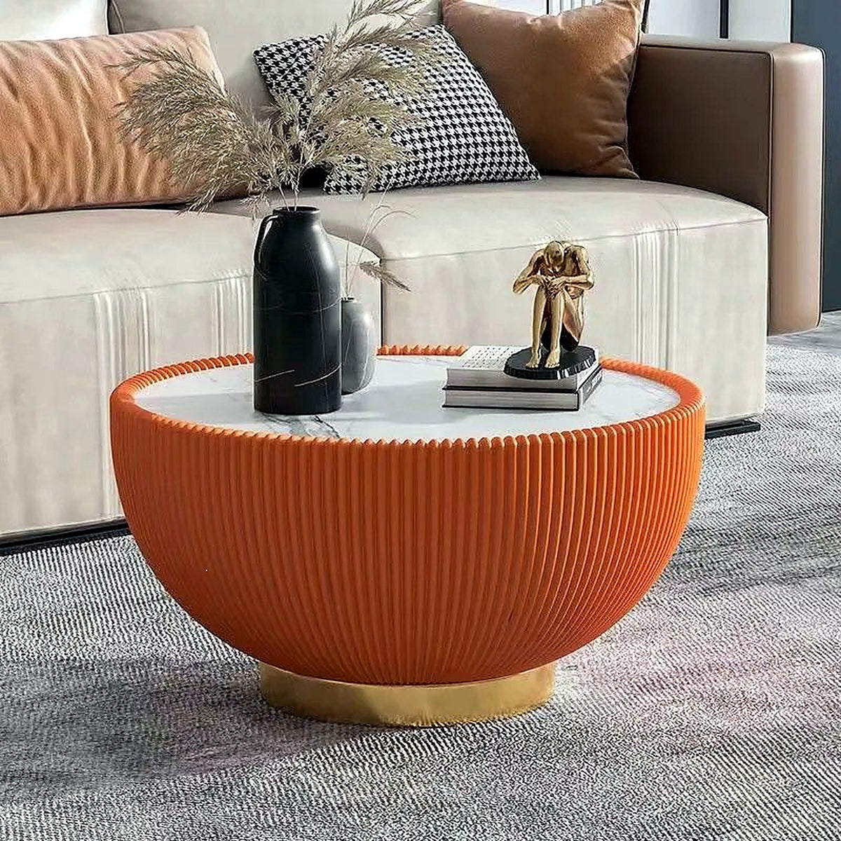 Grande table basse ronde cannelée orange, plateau effet marbre