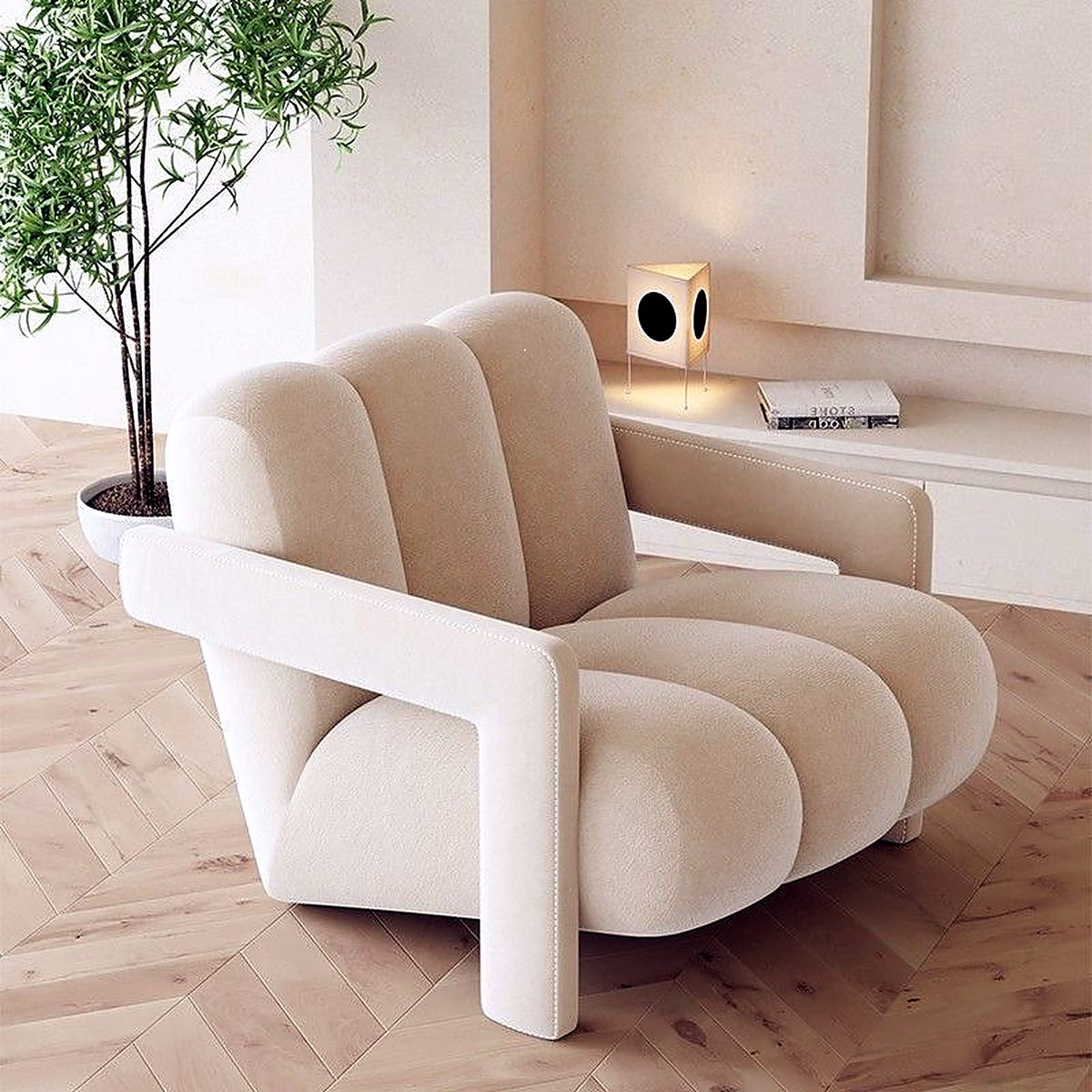 Fauteuil lounge matelassé à côtes en velours blanc crème, ambiance salon