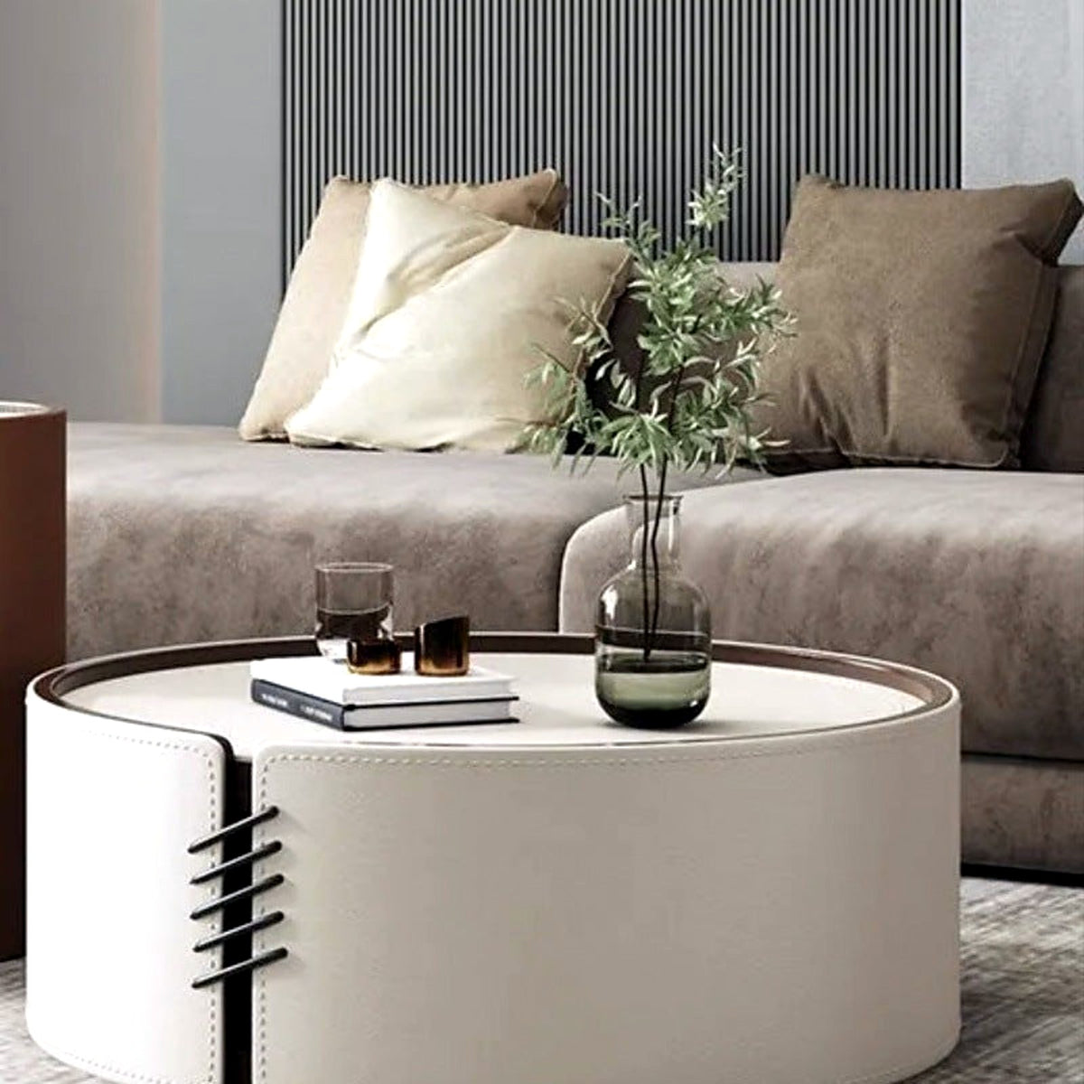 Grande table basse ronde effet cuir blanc crème, plateau pierre frittée